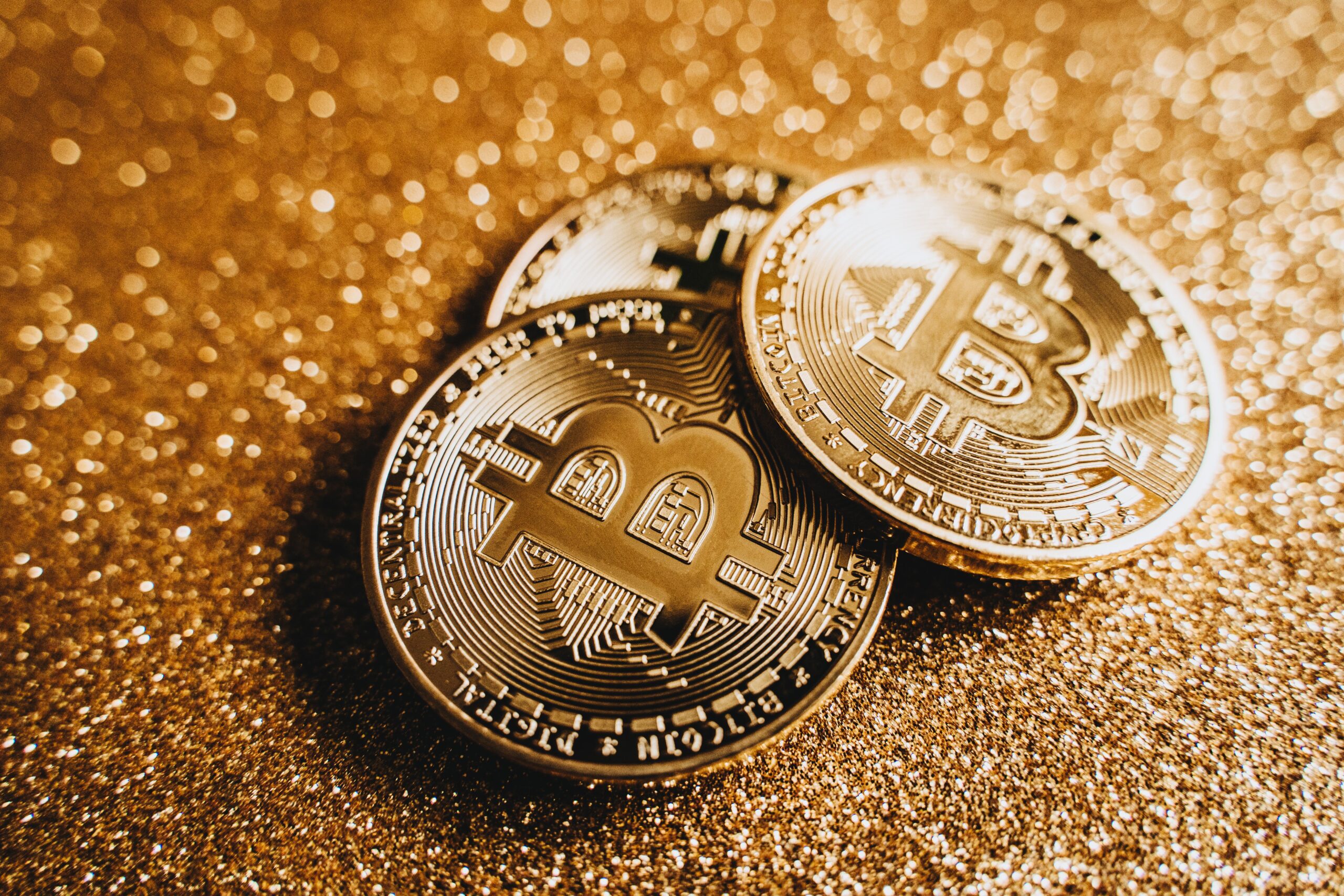 Stacked bitcoin coins under low key light, the look of a slow apocalypse